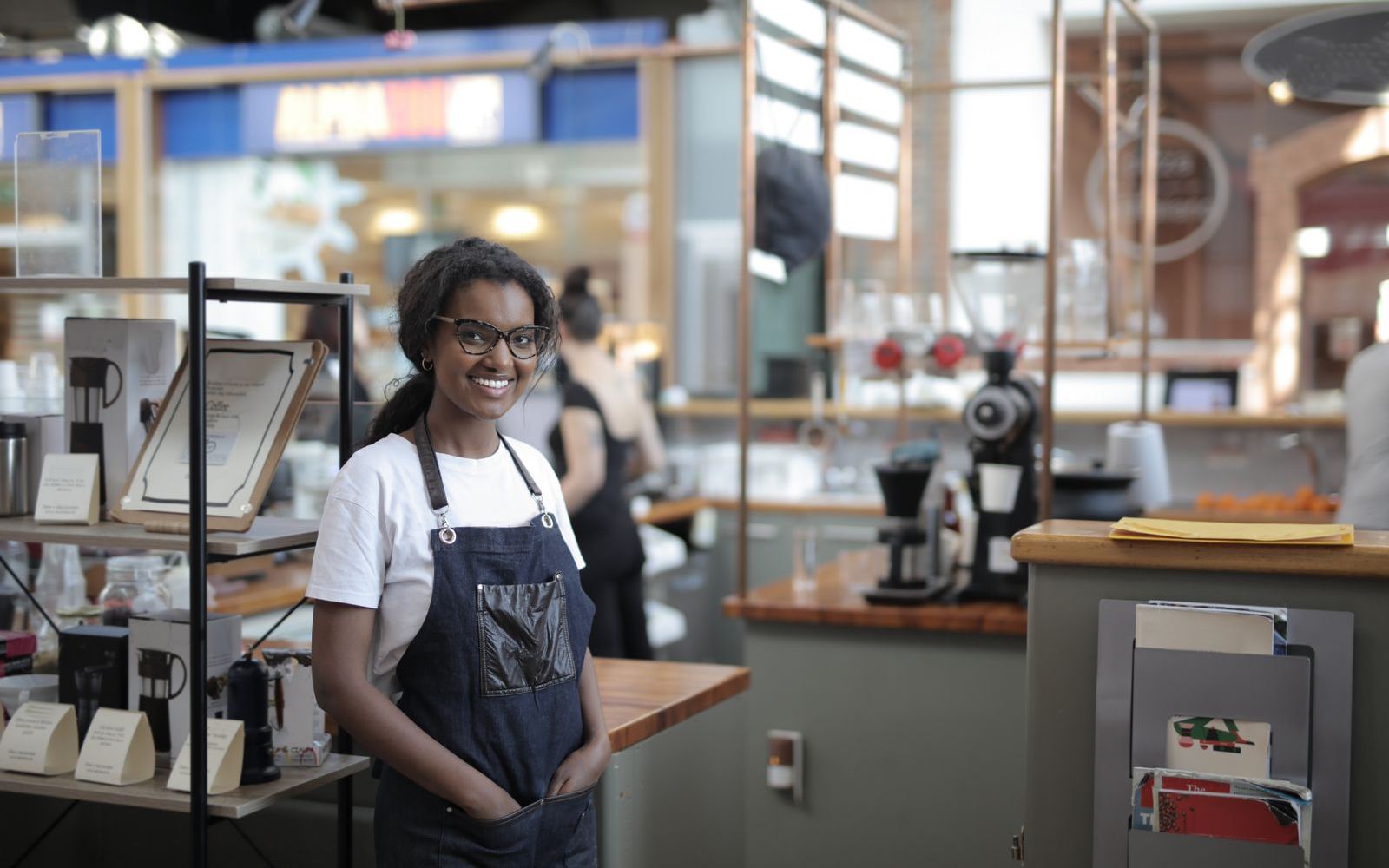 Small business owner in her shop - Amped Marketing helps South Florida SMBs grow